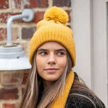 Load image into Gallery viewer, MUSTARD 52% RECYCLED YARN MINI CABLE KNIT FAUX FUR POMPOM HAT
