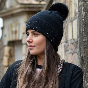 BLACK VISCOSE BLEND HAT WITH STUDDED TRIM & FAUX FUR POMPOM