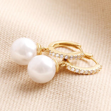 Load image into Gallery viewer, Pearl Drop Crystal Huggie Hoop Earrings in Gold
